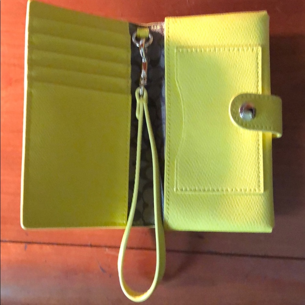NWOT Coach Yellow Crossgrain Leather Wristlet